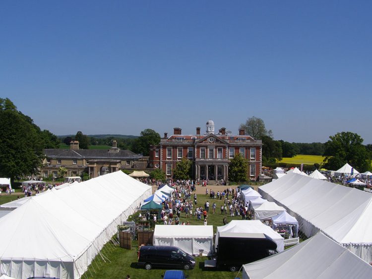 Marquee Hire Hampshire - Stansted House show marquees set up side by side with guests moving between the two.